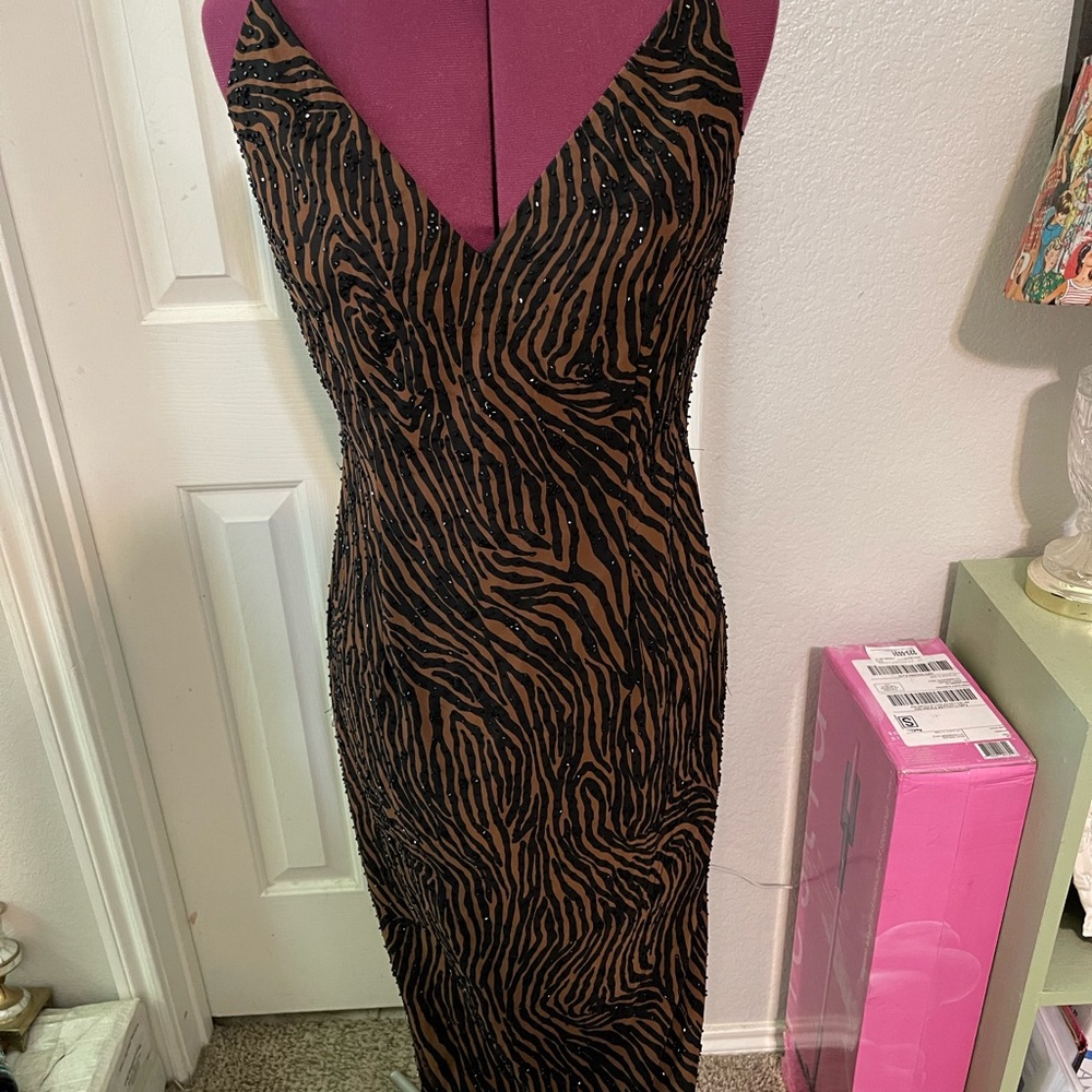 Strappy tiger print evening gown